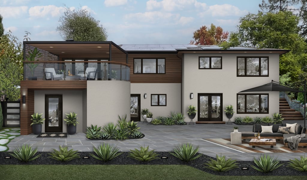Rear of home with roof deck extended from second level
