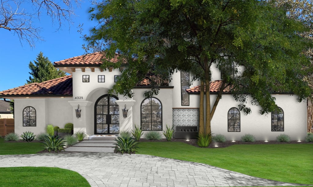 spanish house with outdoor tile on a wall behind a fountain