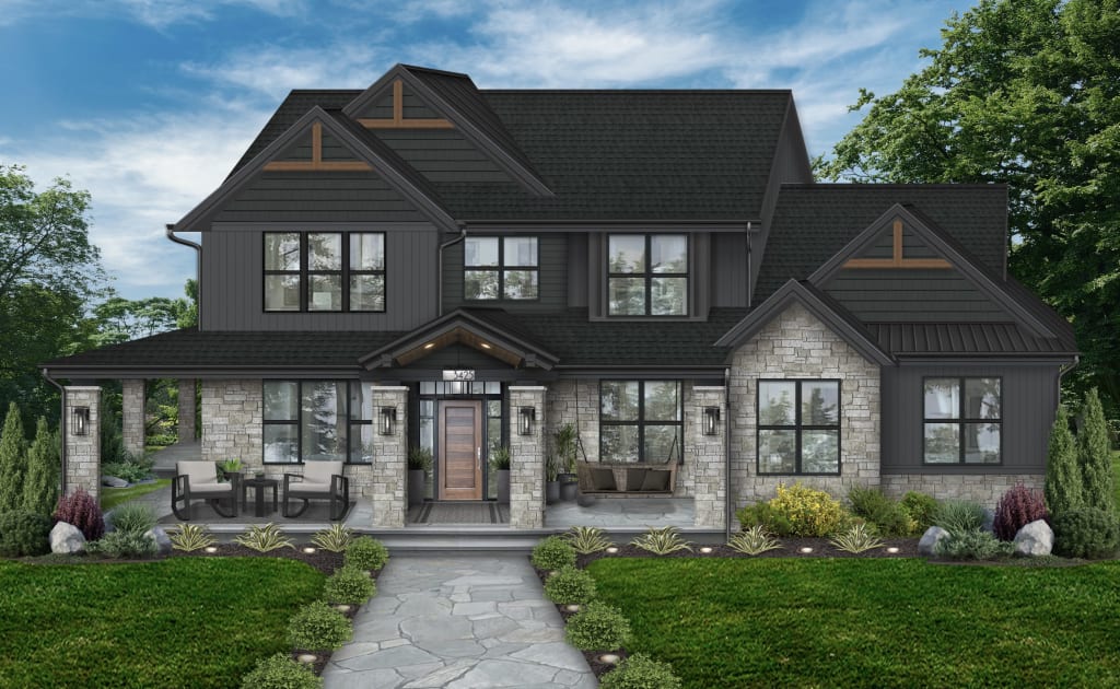 Two-story home with a gray and black exterior accented by natural stone