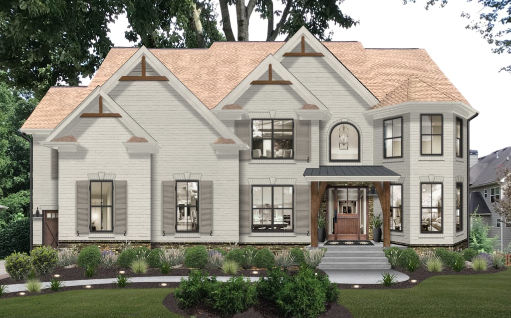 Large traditional home with wood corbels, wood columns, and a tone-on-tone color palette.