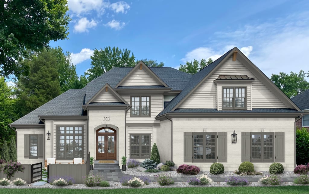 modern house with white siding and brick and gray accents
