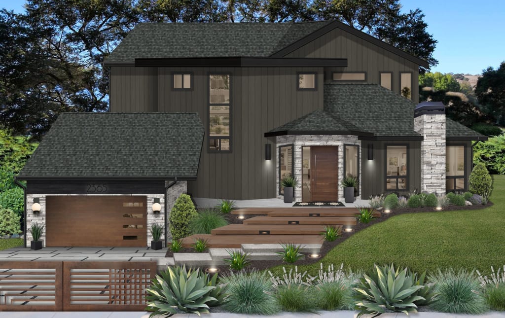 large dark home with a driveway gate