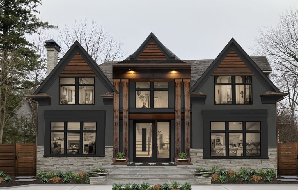 dark rustic modern home with large wooden columns