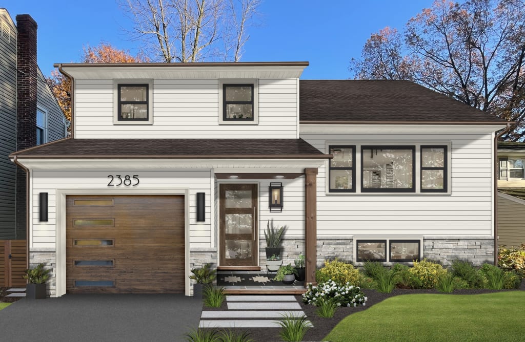 traditional house with white siding and faux copper gutters