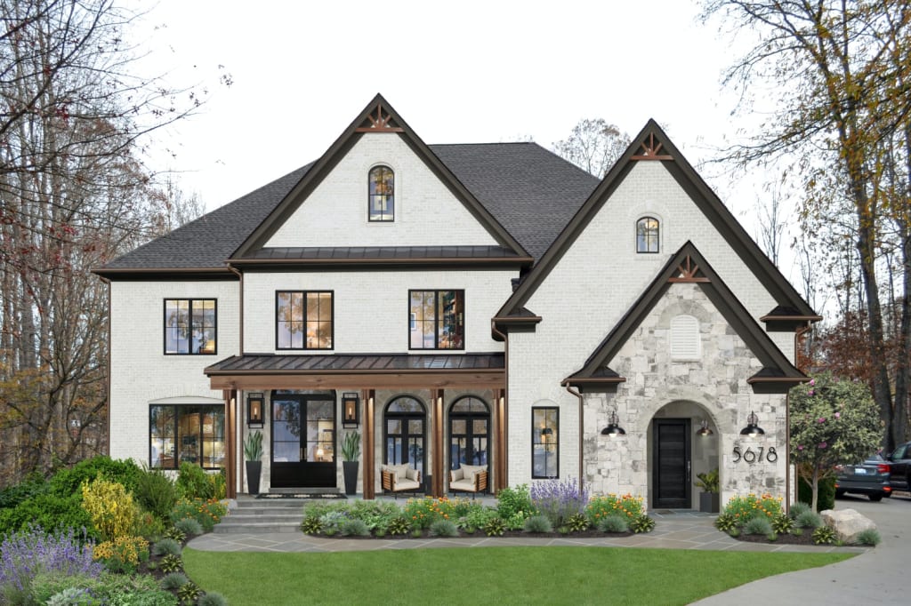 virtual rendering of a tudor-style home painted white with stone accent, black trim and walnut stained wood beams