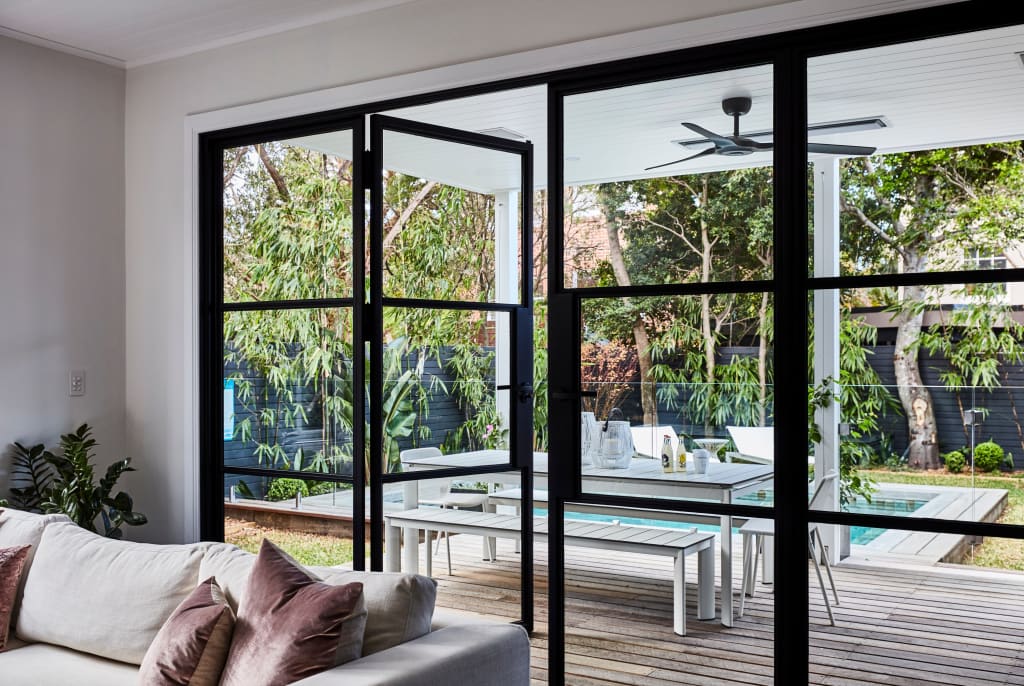 Doors out to a covered porch
