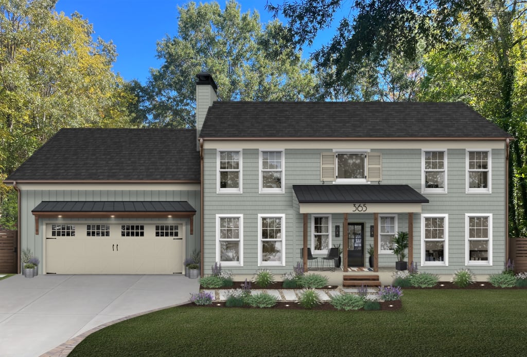 traditional house with awnings on the patio and above the garage