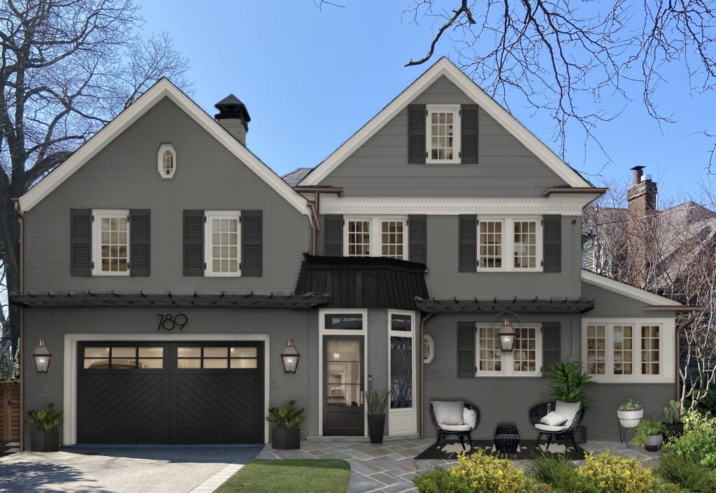 two story traditional home painted in kendall charcoal