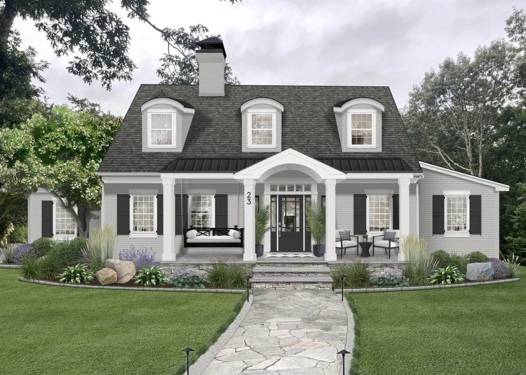 Two-story cottage with arched dormers and an arched portico