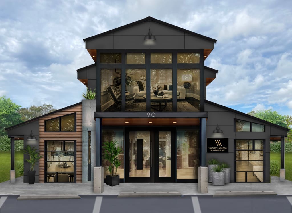 commercial building with charcoal siding and large windows