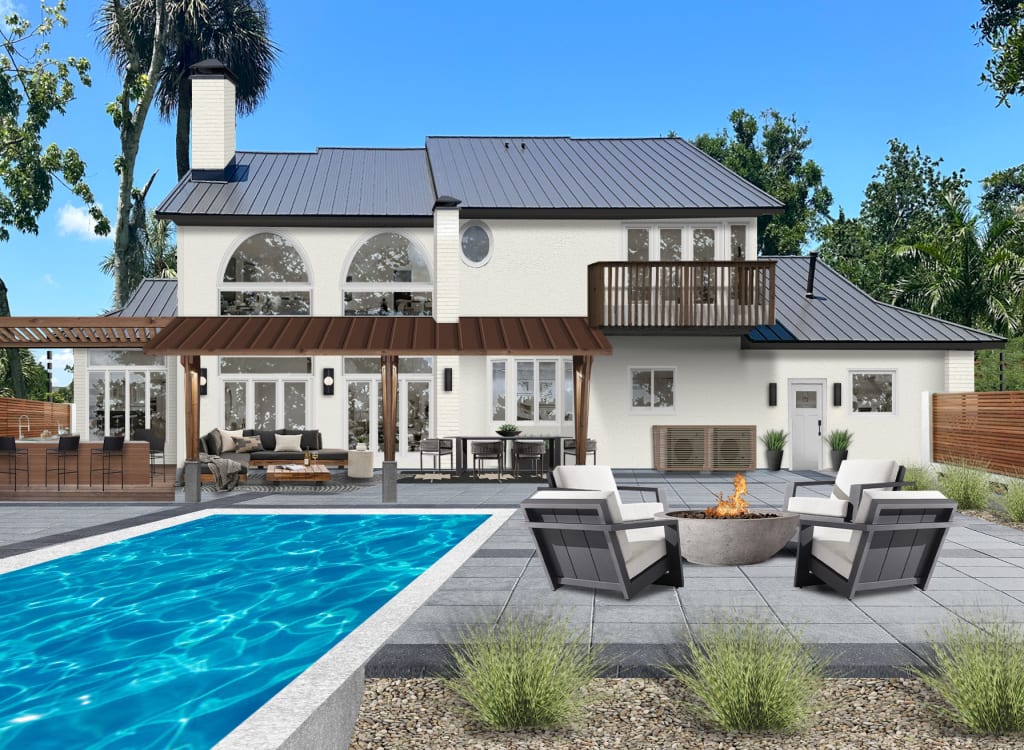 A two-story home with a linear pool, firepit area, and outdoor dining table, outdoor bar, and a balcony.