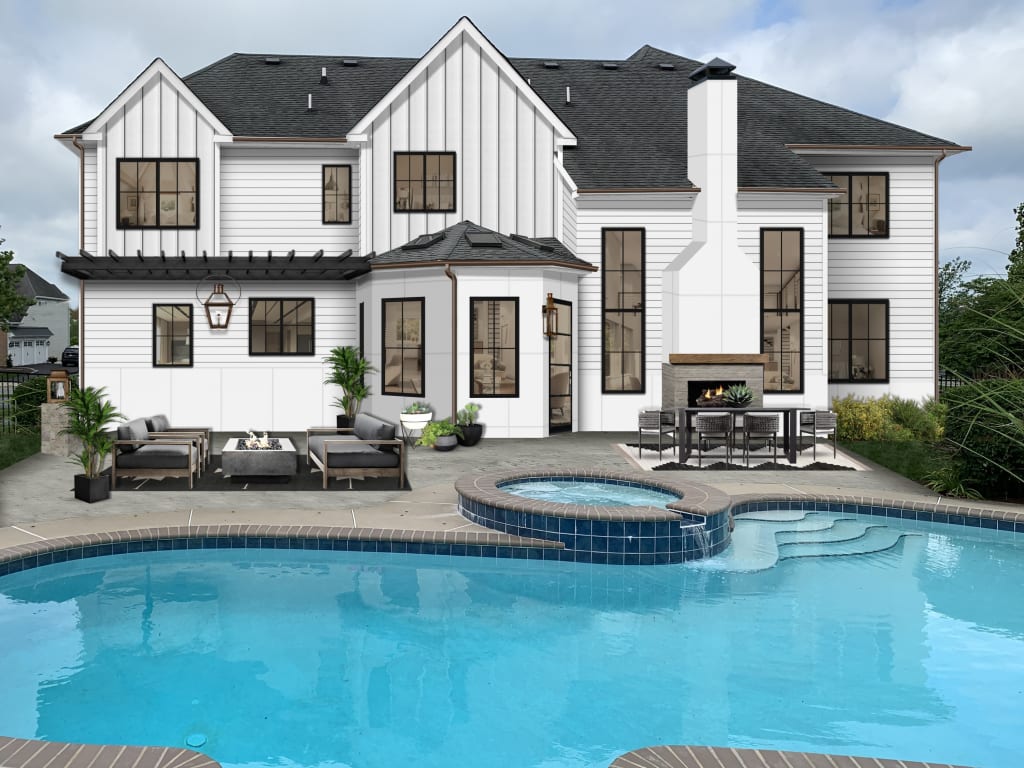 large white home with a pool and hot tub