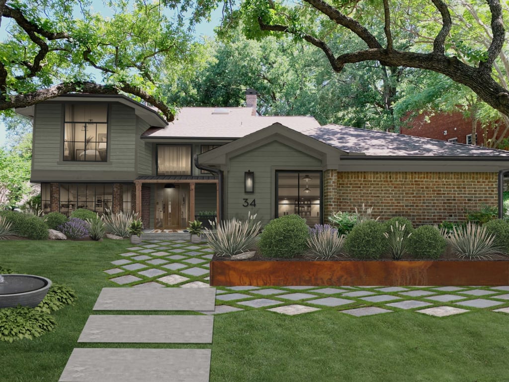 A dark mid-level toned green home with brick siding, cedar columns, black windows, and a bronze retaining wall behind a paver walkway.