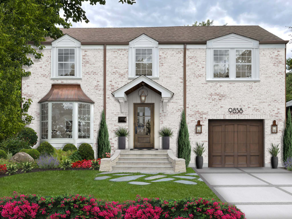 A two-story home with a brown roof