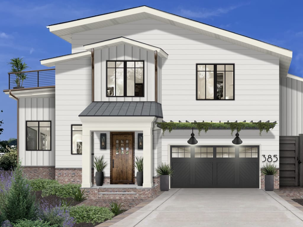 Modern white bungalow with wood stained front door and dark gray garage