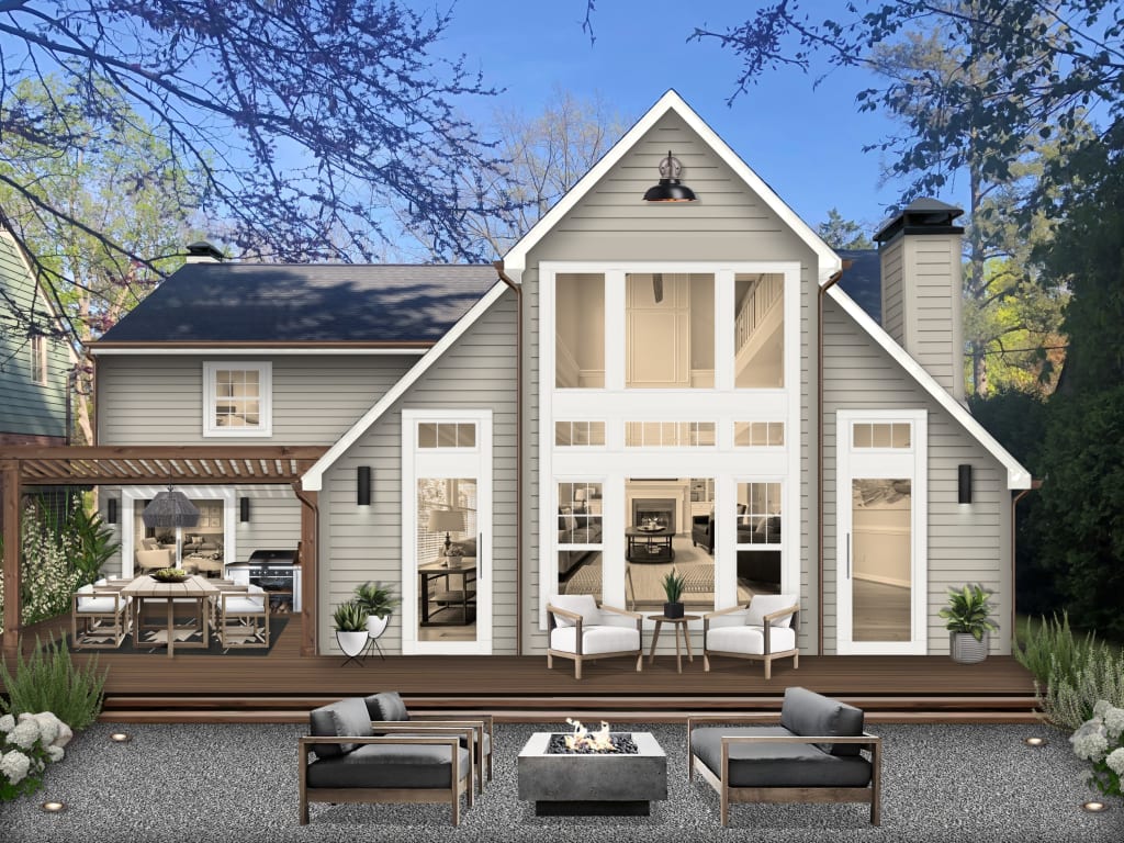 Backyard oasis design with a low deck that runs the length of the home