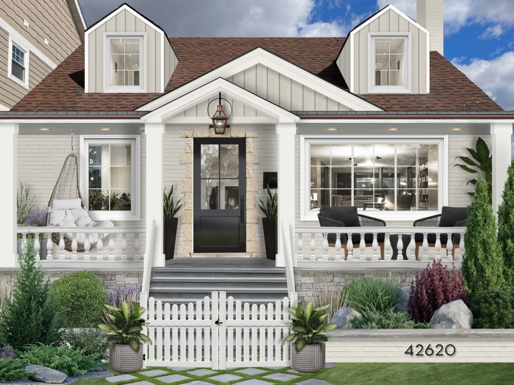 small bright cottage with outdoor living on porch and white picket gate