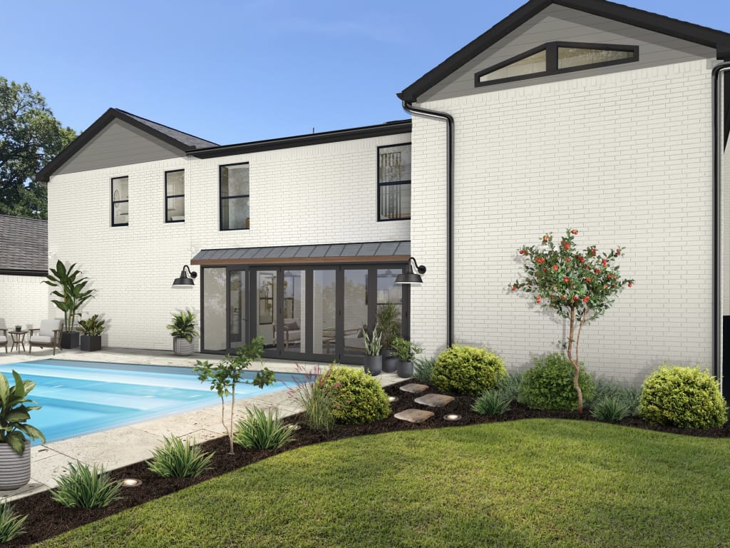 back of a house with a sunroom and pool