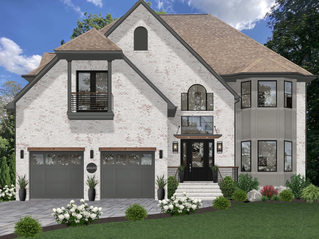 Painted white brick house with a Juliet balcony