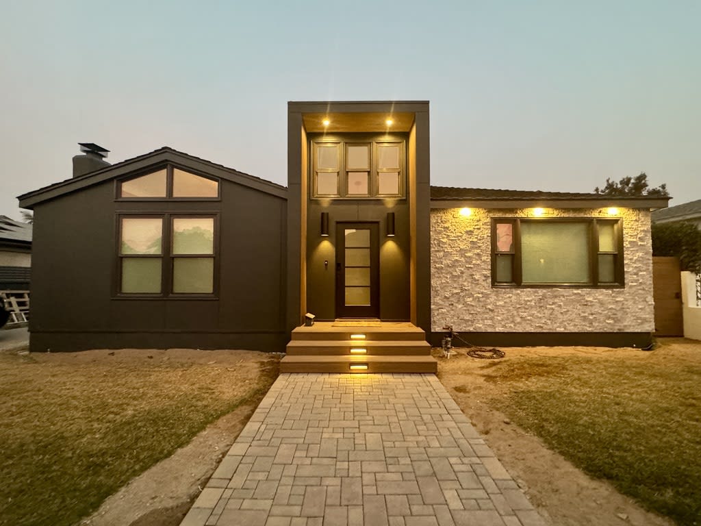 Final exterior created from a brick&batten design.