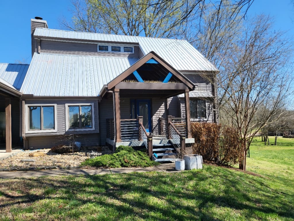 A home exterior with woodpecker damage