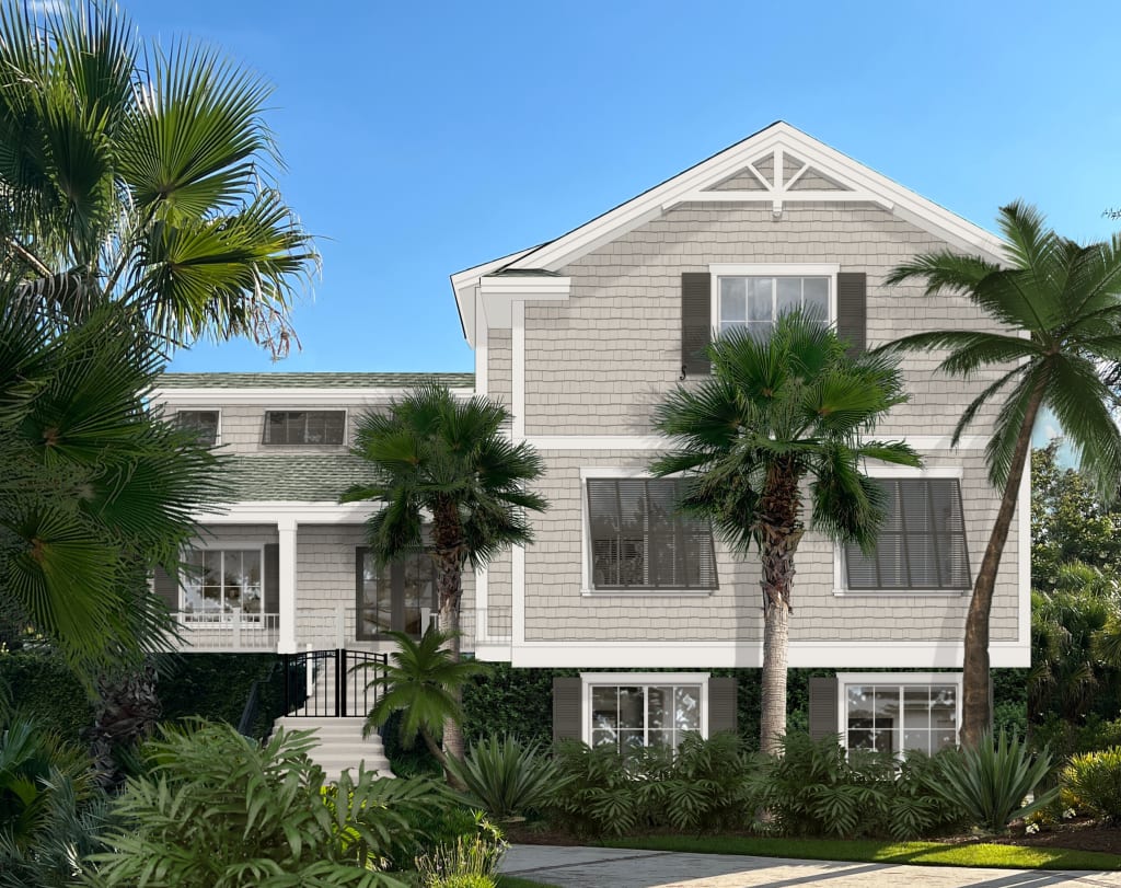 Coastal home exterior with Bermuda storm shutters.