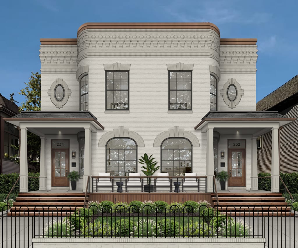 Renovated historic duplex with black windows, tapered columns, a wood front door, and a black metal gate.