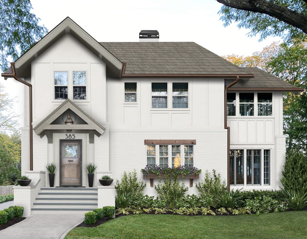 Virtual rendering of a Tudor-style home with cladding in Chantilly Lace by Benjamin Moore