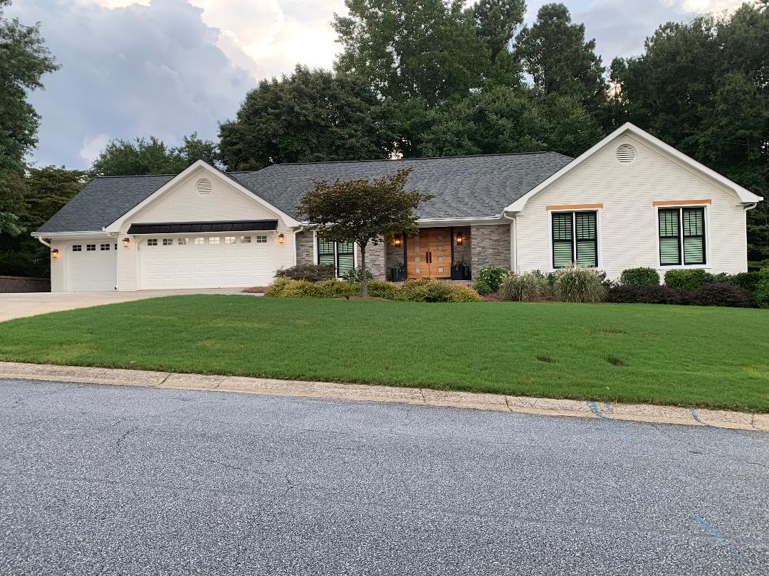 An exterior transformation using brick&batten's virtual rendering.