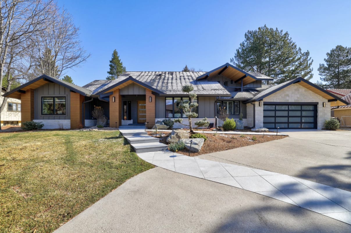A Colorado home after its transformation with brick&batten and the Roofing and Siding Company.
