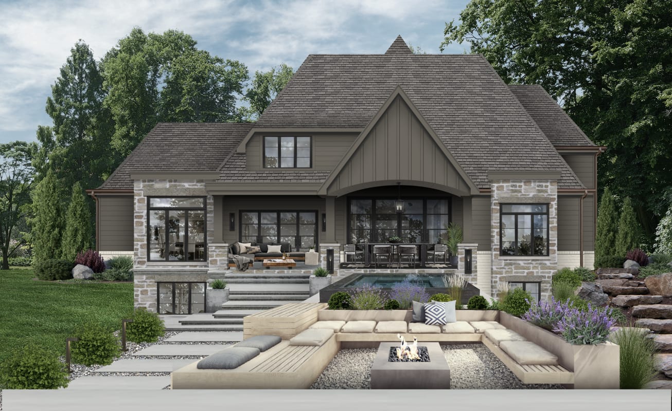 Transitional home design with mixed materials, stone and siding, and beautiful outdoor patio for entertaining