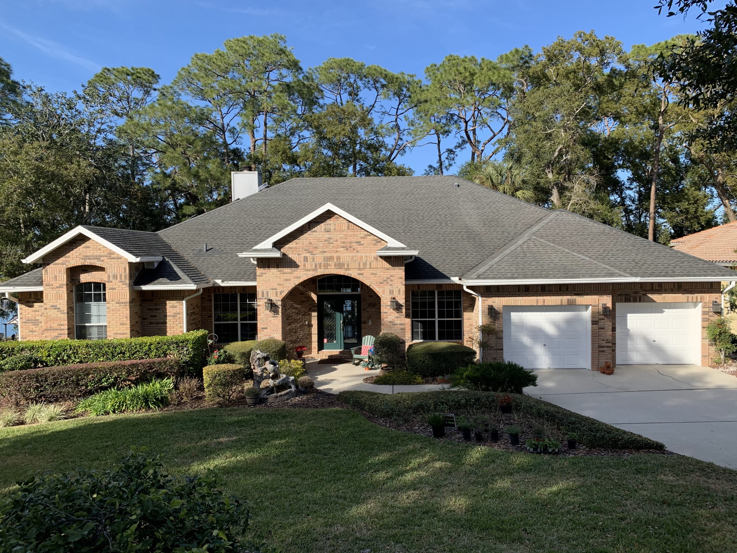Before photo of a brick home.