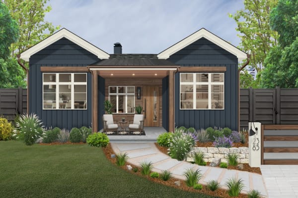 Symmetrical modern cottage style home in navy blue