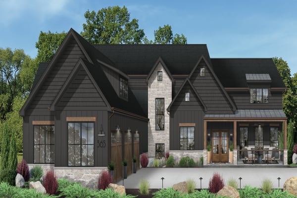 A large black home wiht brown trim