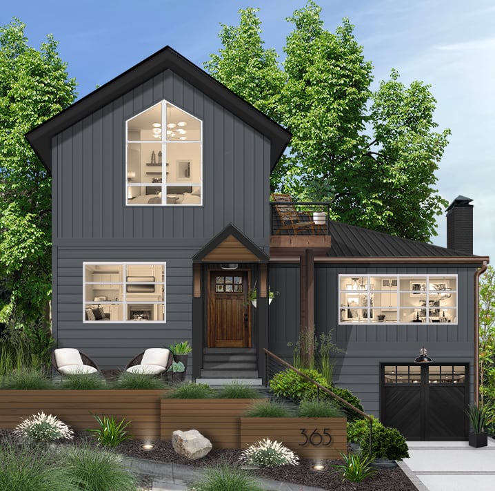 dark home with a wood retaining wall and landscaping