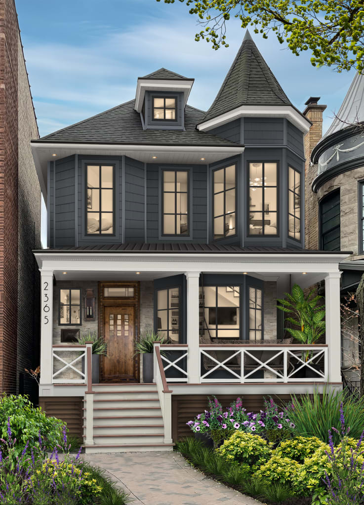 historic home with deep gray-blue blue exterior house colors.