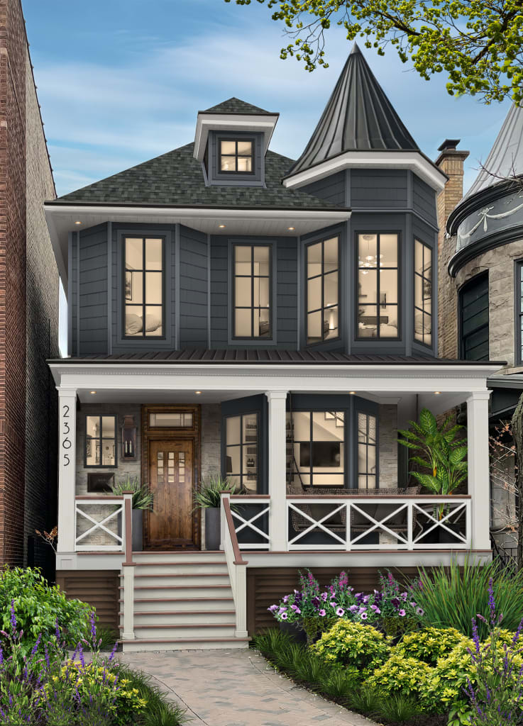 navy blue house with natural brick walkway