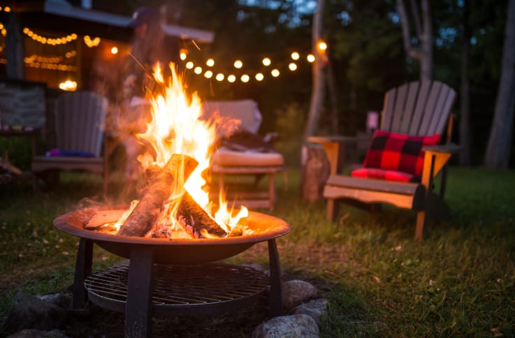 Adirondack chairs around fire pit