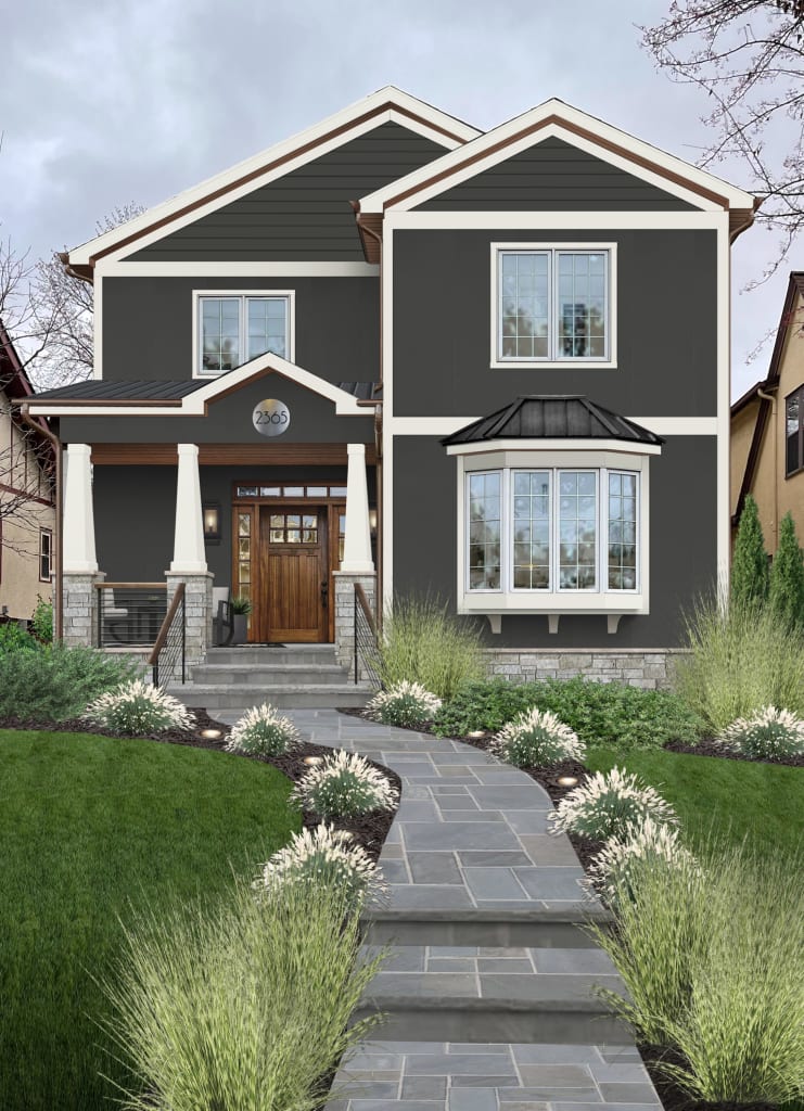 Two-level home painted in shade Iron Ore by Sherwin Williams with a stone walkway and white trim accents.