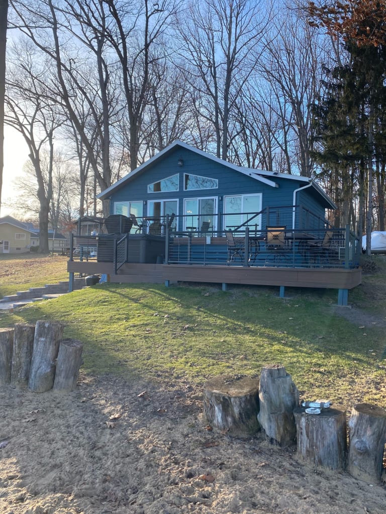 Michigan lake house exterior actual after from a distance