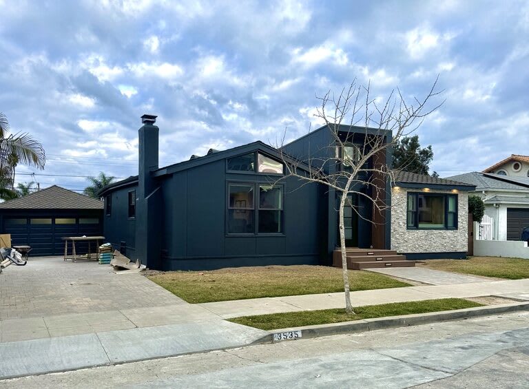 Final exterior created from a brick&batten design.
