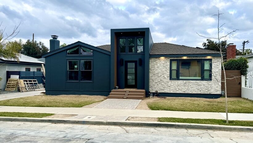 Final exterior created from a brick&batten design.