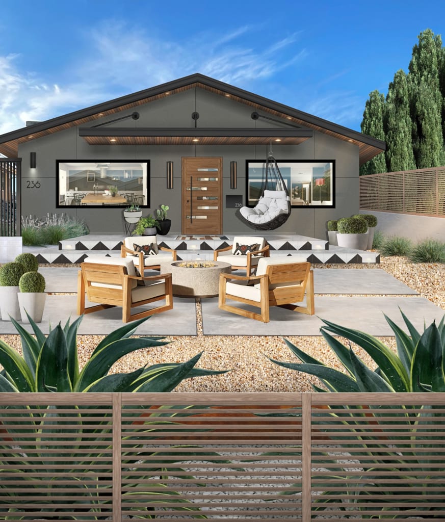 wood fence around a gray home