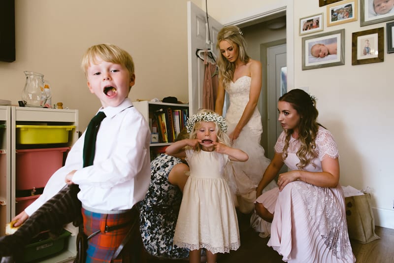 page boy and flower girl getting ready for a wedding. best wedding photos 