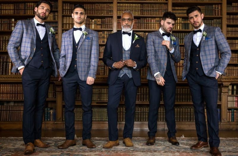 Groomsmen wearing wedding suits