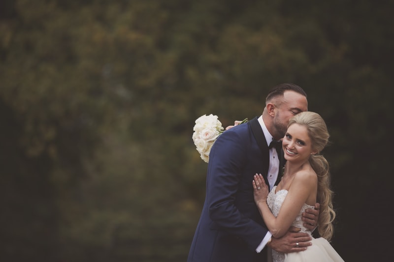 Faye's father about to hug her on her wedding day