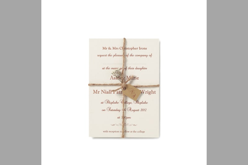 Bridebook.co.uk-Papteterie-Eugénie-wedding-inviation-wrapped-up-with-brown-string