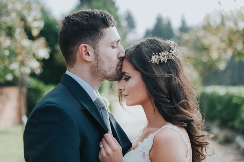 Faye's father about to hug her on her wedding day