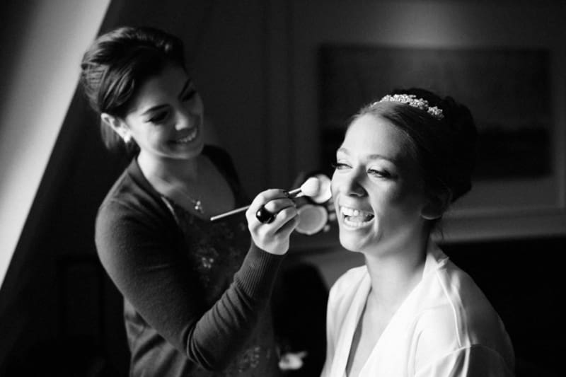 Bridebook.co.uk- bride and makeup artist laughing