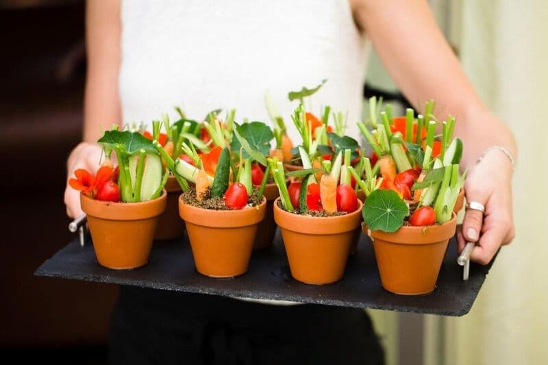 Bridebook.co.uk - wedding food carrots in a flower point